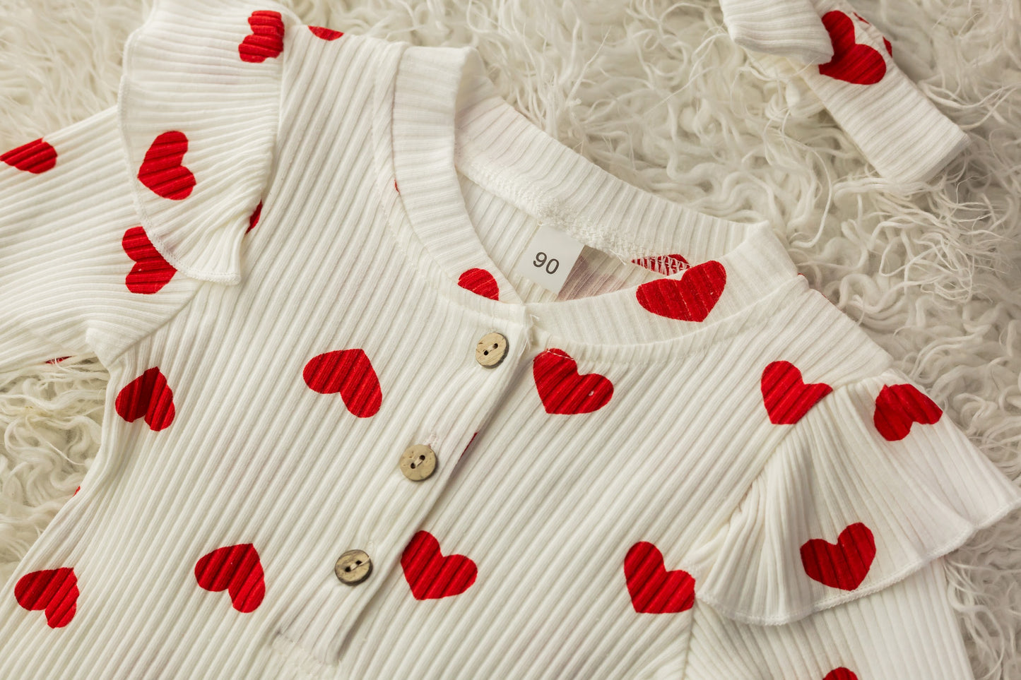 Baby romper with hearts