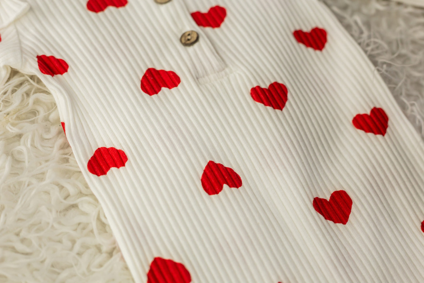 Baby romper with hearts