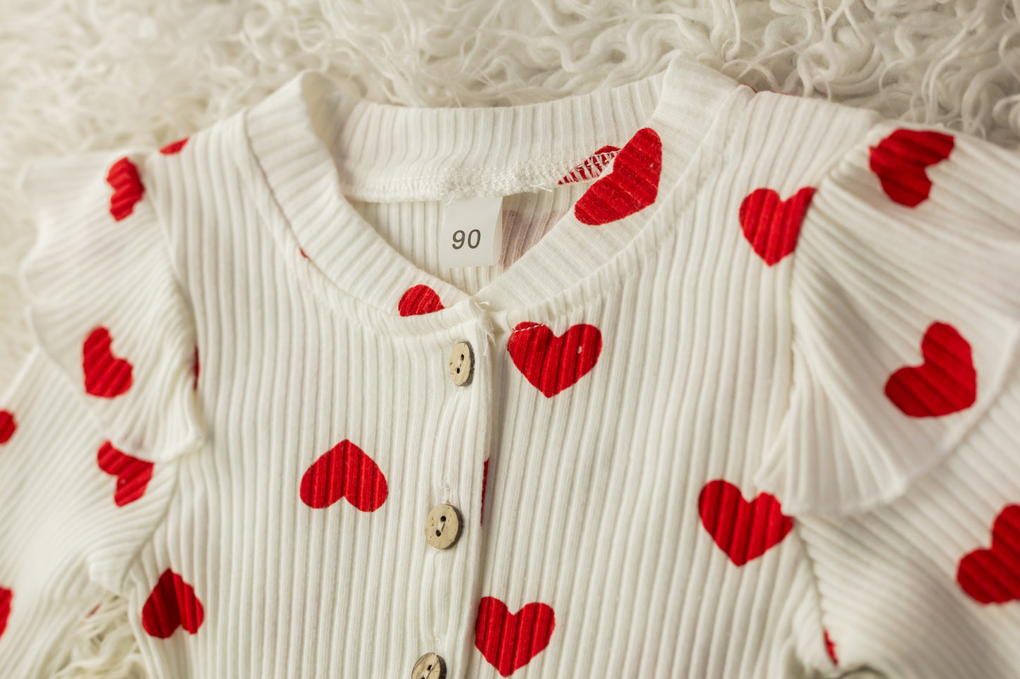 Baby romper with hearts