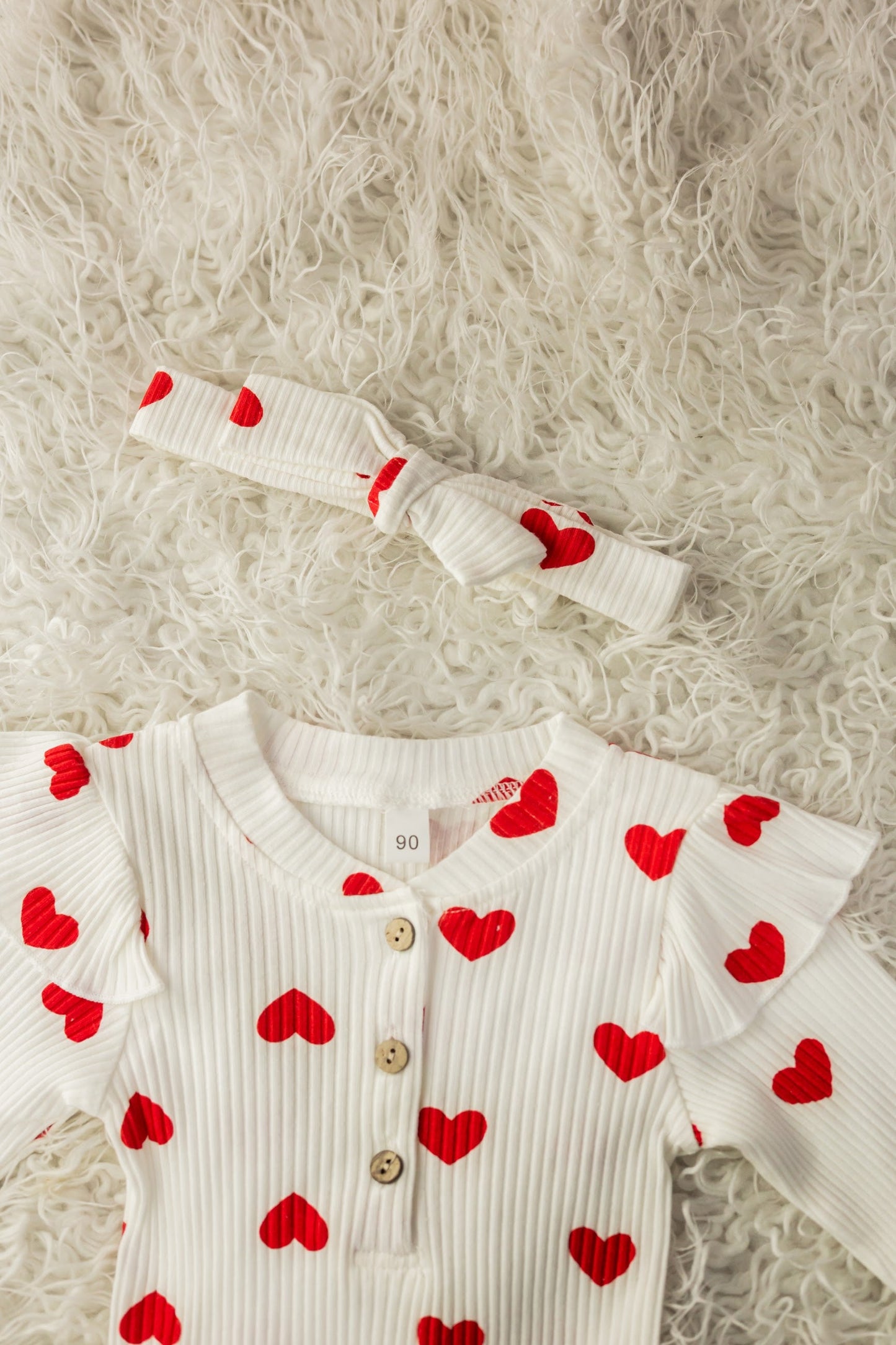 Baby romper with hearts