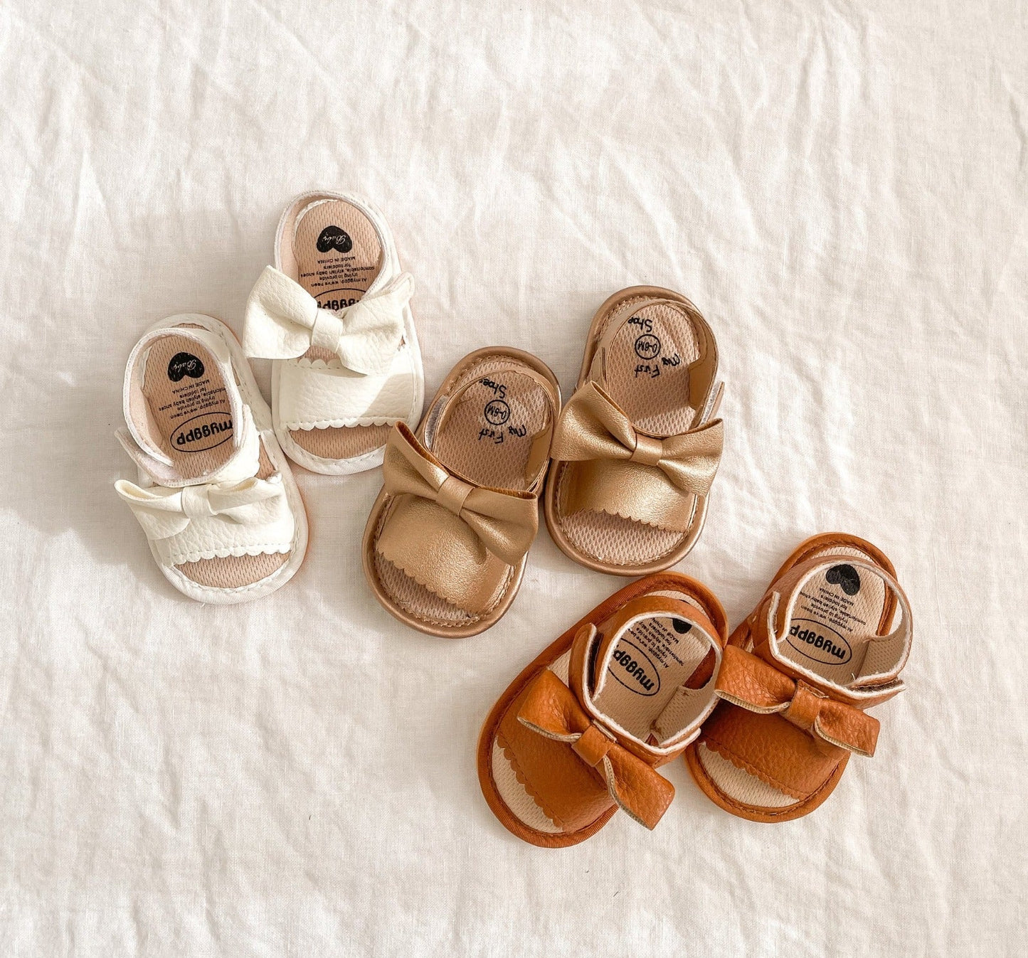 Baby synthetic leather sandal with bow